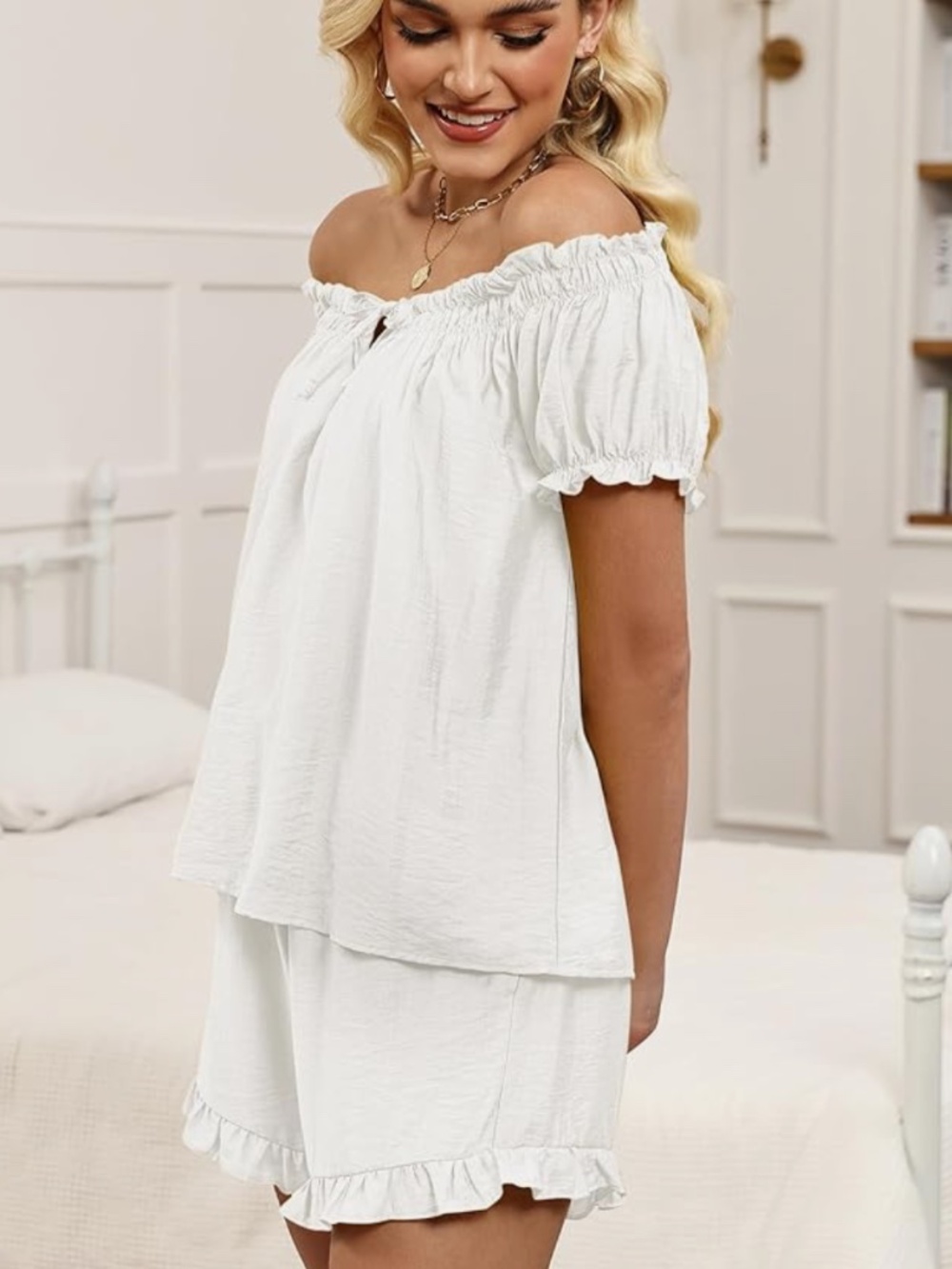 Lightweight off-shoulder sleep set in white. Soft fabric with elasticized neckli